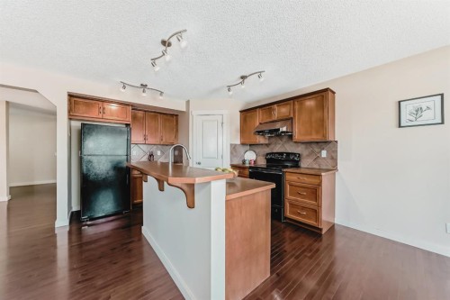 273 Silverado Plains Close Sw, Calgary, AB - Indoor Photo Showing Kitchen