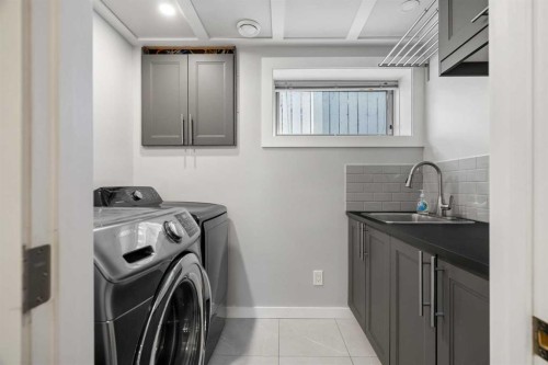 276 Riverside Mews Se, Calgary, AB - Indoor Photo Showing Laundry Room