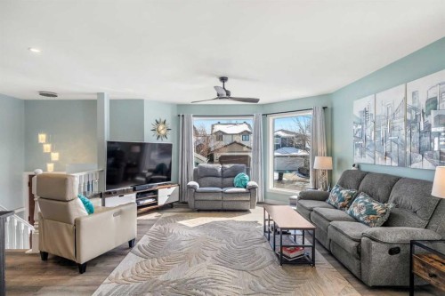 276 Riverside Mews Se, Calgary, AB - Indoor Photo Showing Living Room