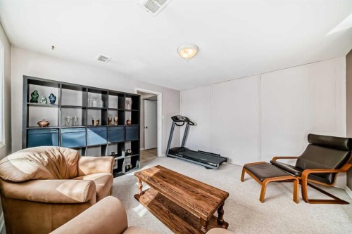 824 Bridge Crescent Ne, Calgary, AB - Indoor Photo Showing Gym Room