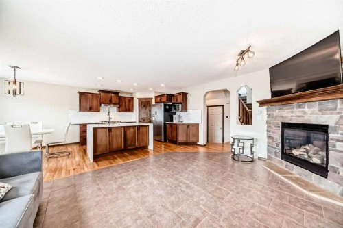 7 Tuscany Ridge Crescent Nw, Calgary, AB - Indoor With Fireplace