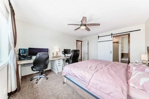 7 Tuscany Ridge Crescent Nw, Calgary, AB - Indoor Photo Showing Bedroom