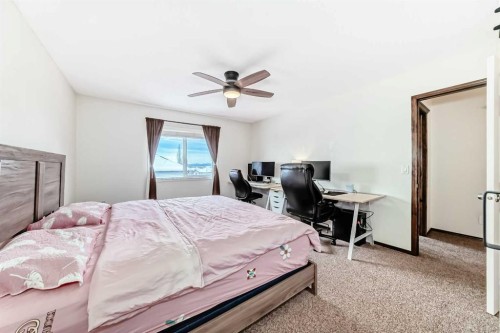 7 Tuscany Ridge Crescent Nw, Calgary, AB - Indoor Photo Showing Bedroom