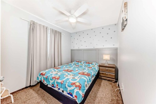 7 Tuscany Ridge Crescent Nw, Calgary, AB - Indoor Photo Showing Bedroom