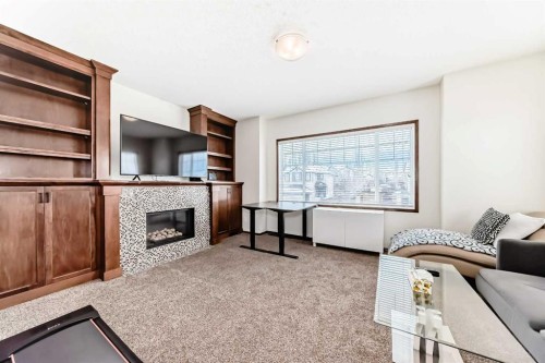 7 Tuscany Ridge Crescent Nw, Calgary, AB - Indoor With Fireplace
