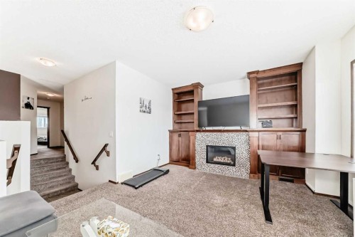 7 Tuscany Ridge Crescent Nw, Calgary, AB - Indoor With Fireplace