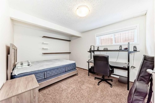 7 Tuscany Ridge Crescent Nw, Calgary, AB - Indoor Photo Showing Bedroom