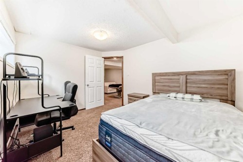 7 Tuscany Ridge Crescent Nw, Calgary, AB - Indoor Photo Showing Bedroom