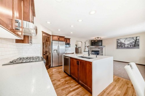 7 Tuscany Ridge Crescent Nw, Calgary, AB - Indoor Photo Showing Kitchen With Double Sink