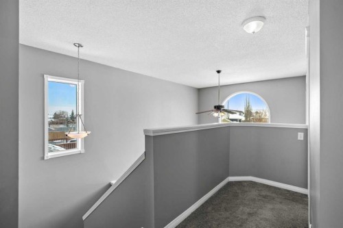 27 Henderson Road Ne, Langdon, AB - Indoor Photo Showing Other Room