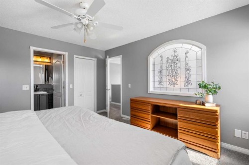 27 Henderson Road Ne, Langdon, AB - Indoor Photo Showing Bedroom