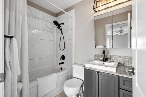 27 Henderson Road Ne, Langdon, AB - Indoor Photo Showing Bathroom