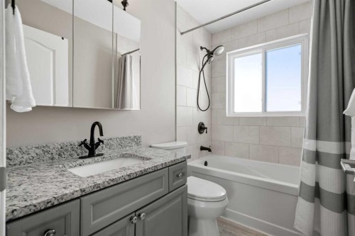 27 Henderson Road Ne, Langdon, AB - Indoor Photo Showing Bathroom