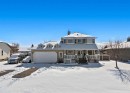 27 Henderson Road Ne, Langdon, AB  - Outdoor With Facade 