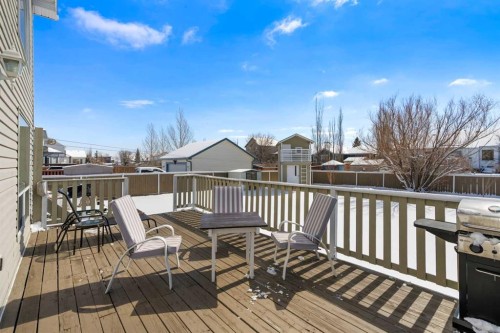 27 Henderson Road Ne, Langdon, AB - Outdoor With Deck Patio Veranda With Exterior
