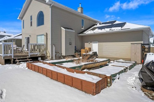 27 Henderson Road Ne, Langdon, AB - Outdoor With Deck Patio Veranda With Exterior