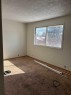 128 Dovercrest Way Se, Calgary, AB  - Indoor Photo Showing Other Room 