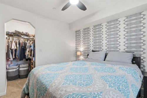 1102-755 Copperpond Boulevard Se, Calgary, AB - Indoor Photo Showing Bedroom