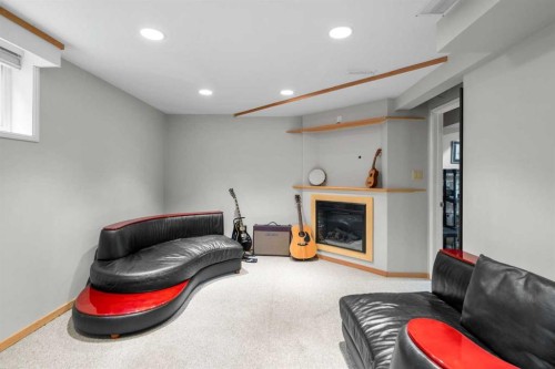 104 Midland Crescent Se, Calgary, AB - Indoor With Fireplace
