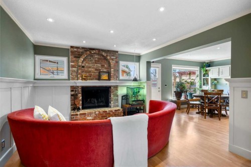 104 Midland Crescent Se, Calgary, AB - Indoor Photo Showing Living Room With Fireplace