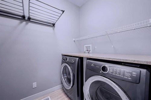 121 Marquis View Se, Calgary, AB - Indoor Photo Showing Laundry Room