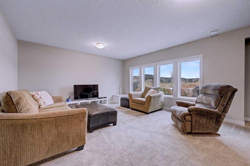 121 Marquis View Se, Calgary, AB - Indoor Photo Showing Living Room