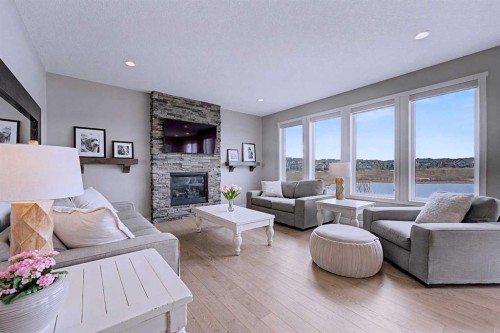 121 Marquis View Se, Calgary, AB - Indoor Photo Showing Living Room With Fireplace
