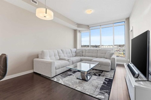 705-24 Varsity Estates Circle Nw, Calgary, AB - Indoor Photo Showing Living Room