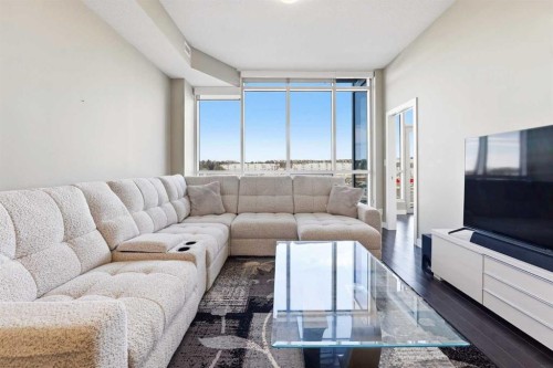 705-24 Varsity Estates Circle Nw, Calgary, AB - Indoor Photo Showing Living Room