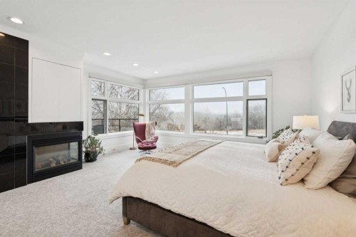 3834 1A Street Sw, Calgary, AB - Indoor Photo Showing Bedroom With Fireplace