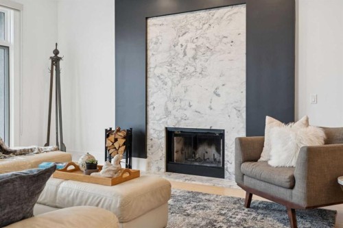 3834 1A Street Sw, Calgary, AB - Indoor Photo Showing Living Room With Fireplace