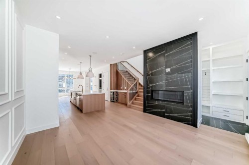 515 34A Street Nw, Calgary, AB - Indoor With Fireplace