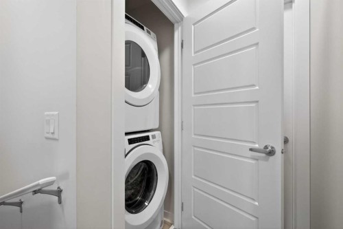306-338 Seton Circle Se, Calgary, AB - Indoor Photo Showing Laundry Room