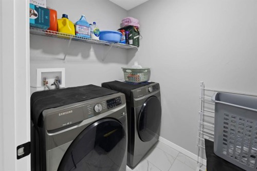 127 Calhoun Crescent Ne, Calgary, AB - Indoor Photo Showing Laundry Room