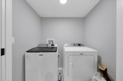 127 Calhoun Crescent Ne, Calgary, AB - Indoor Photo Showing Laundry Room