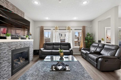 148 Walden Square Se, Calgary, AB - Indoor Photo Showing Living Room With Fireplace