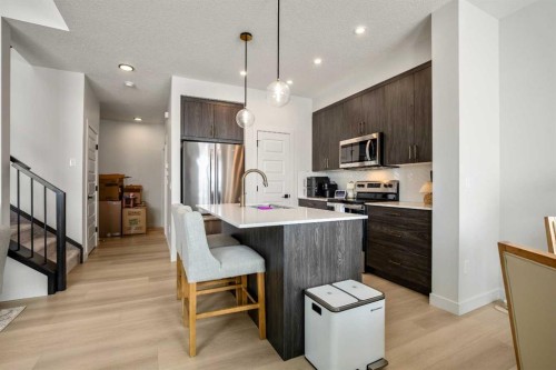 3085 Key Drive Sw, Airdrie, AB - Indoor Photo Showing Kitchen With Upgraded Kitchen