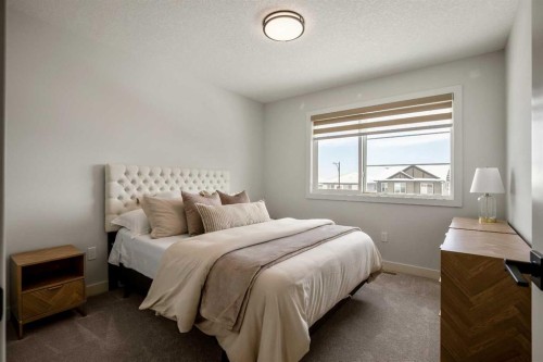 3085 Key Drive Sw, Airdrie, AB - Indoor Photo Showing Bedroom