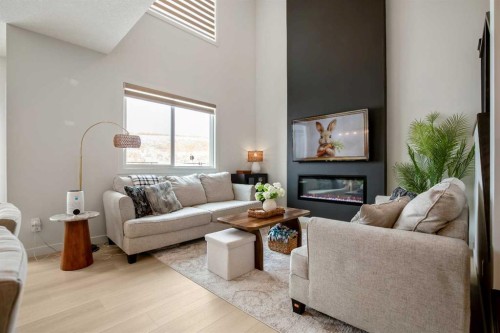 3085 Key Drive Sw, Airdrie, AB - Indoor Photo Showing Living Room With Fireplace