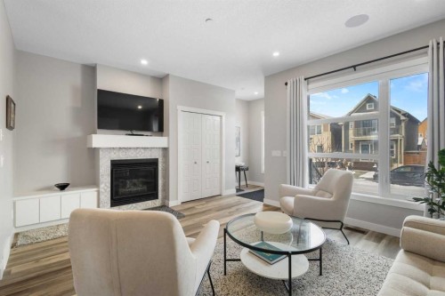45 Howse Street Ne, Calgary, AB - Indoor Photo Showing Living Room With Fireplace