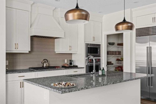24 Cranbrook Cape Se, Calgary, AB - Indoor Photo Showing Kitchen With Upgraded Kitchen