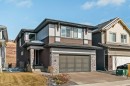 24 Cranbrook Cape Se, Calgary, AB  - Outdoor With Facade 