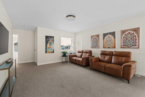 24 Cranbrook Cape Se, Calgary, AB - Indoor Photo Showing Living Room