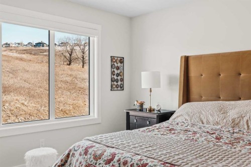 24 Cranbrook Cape Se, Calgary, AB - Indoor Photo Showing Bedroom