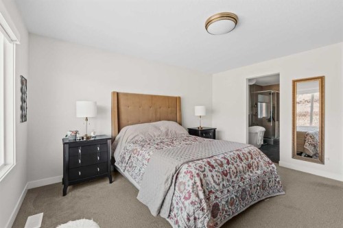 24 Cranbrook Cape Se, Calgary, AB - Indoor Photo Showing Bedroom