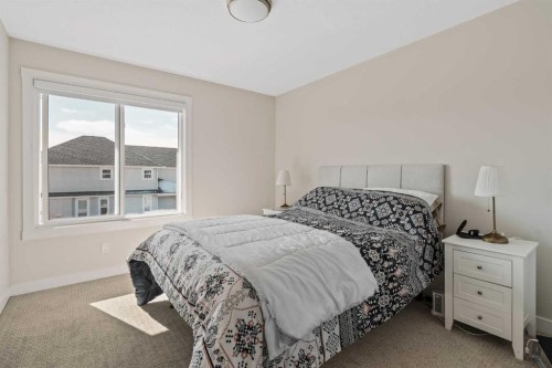 24 Cranbrook Cape Se, Calgary, AB - Indoor Photo Showing Bedroom
