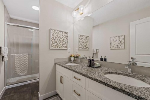 24 Cranbrook Cape Se, Calgary, AB - Indoor Photo Showing Bathroom