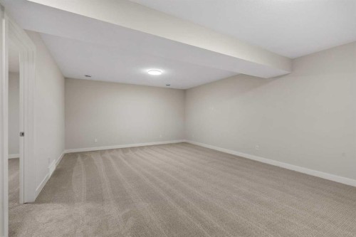 24 Cranbrook Cape Se, Calgary, AB - Indoor Photo Showing Other Room