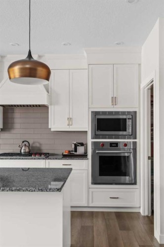 24 Cranbrook Cape Se, Calgary, AB - Indoor Photo Showing Kitchen With Upgraded Kitchen
