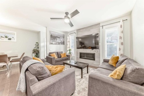 423 Redstone Drive Ne, Calgary, AB - Indoor Photo Showing Living Room With Fireplace